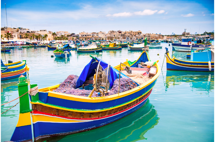Traditional Luzzu boat in Malta, featured in Malta Quest
